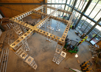 A large metal climbing center in a training facility.